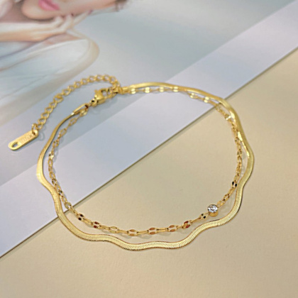 Bransoletka na rękę stal chirurgiczna pozłacana 14k złotem, podwójna, żyłka cyrkonie BST1513