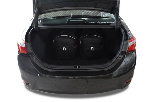 TOYOTA COROLLA LIMOUSINE 2013+ TORBY DO BAGAŻNIKA 4 SZT KJUST