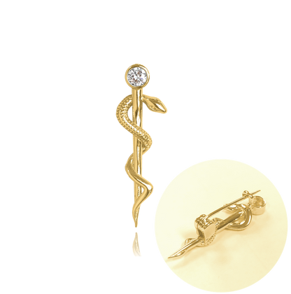 MINET Pozłacana srebrna broszka laska Eskulapa z białą cyrkonią