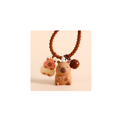 Brelok do kluczy Kapibara 4x 2,5 cm z ptaszkiem, przywieszką i dzwoneczkiem BRL338