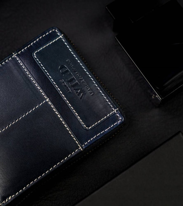 Duży, skórzany portfel męski na suwak