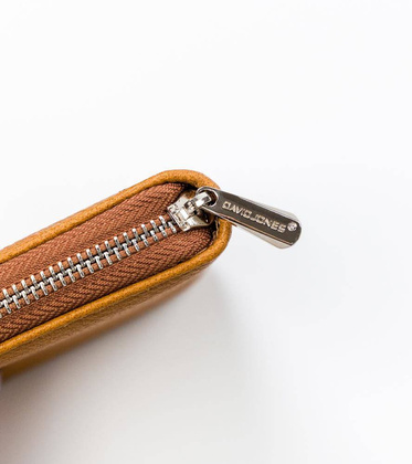 Poręczny portfel damski z ziarnistej skóry eko zapinany suwakiem