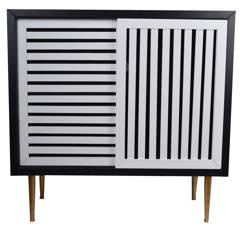 Szafka czarna z białymi przesuwnymi drzwiami na złotych nogach